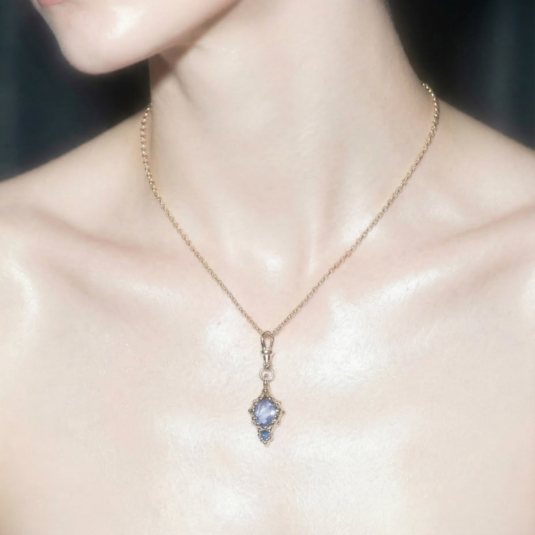 9ct yellow Gold victorian inspired sapphire pendant necklace on a model