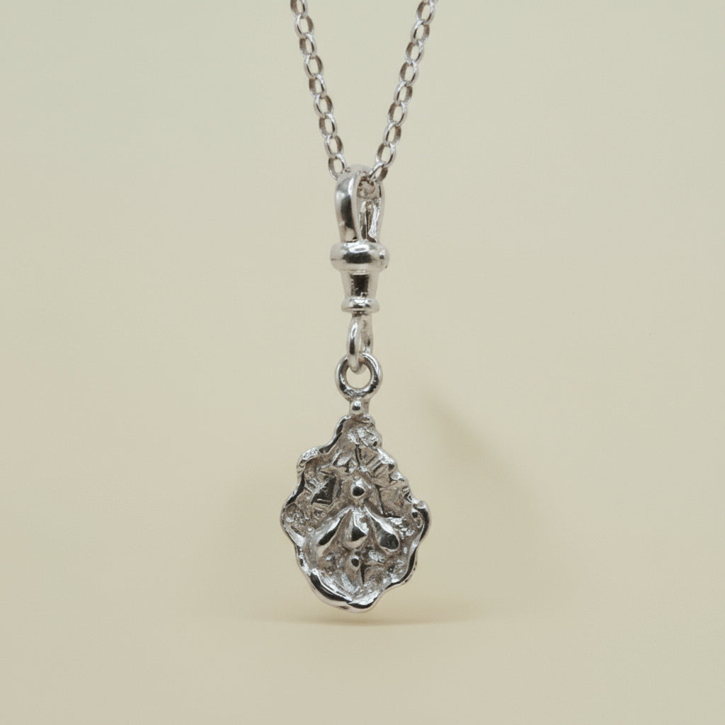 THE ECHO FLORA PENDANT — Reversible Charm (Sterling Silver)