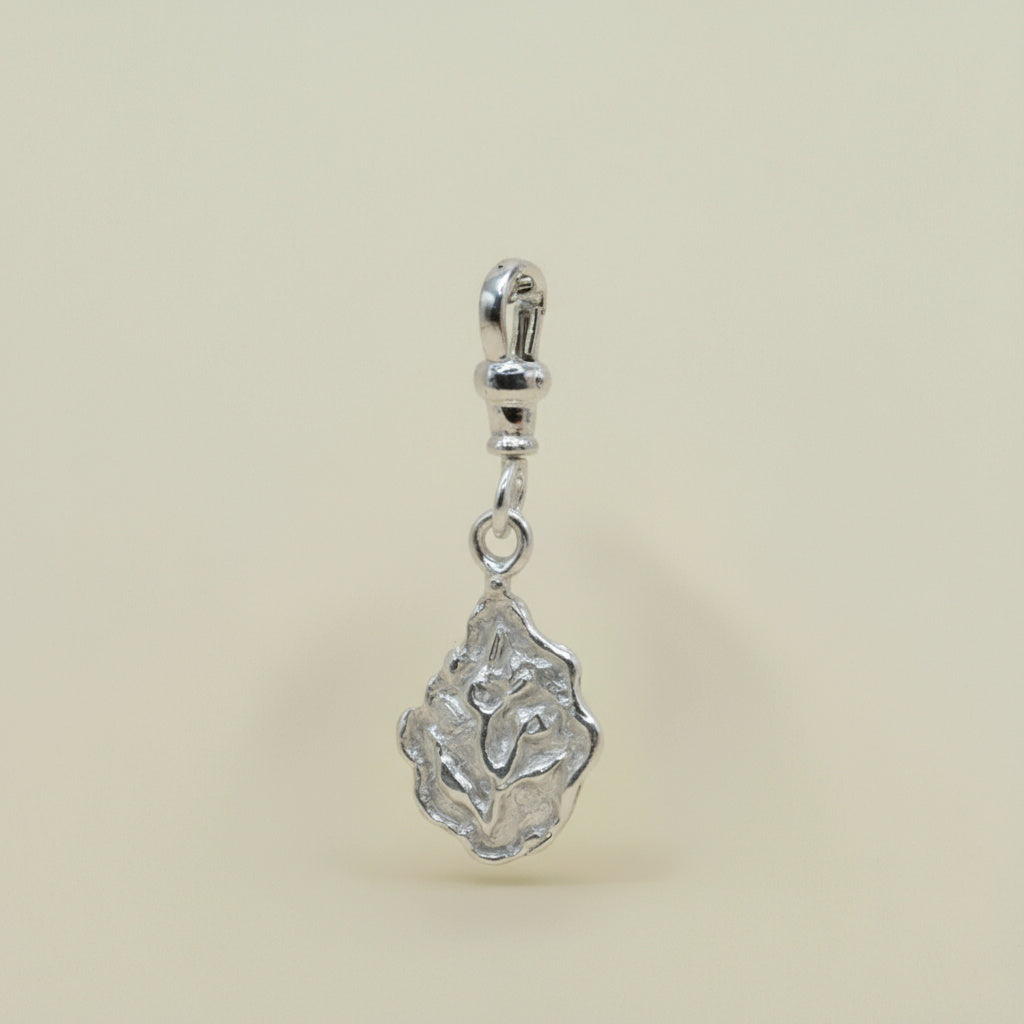 THE ECHO FLORA PENDANT — Reversible Charm (Sterling Silver)