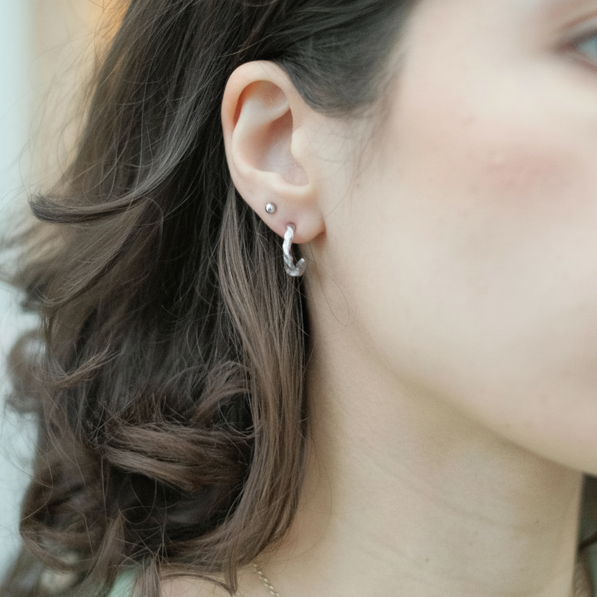 THE TWISTED BEESWAX HOOPS — Sterling Silver