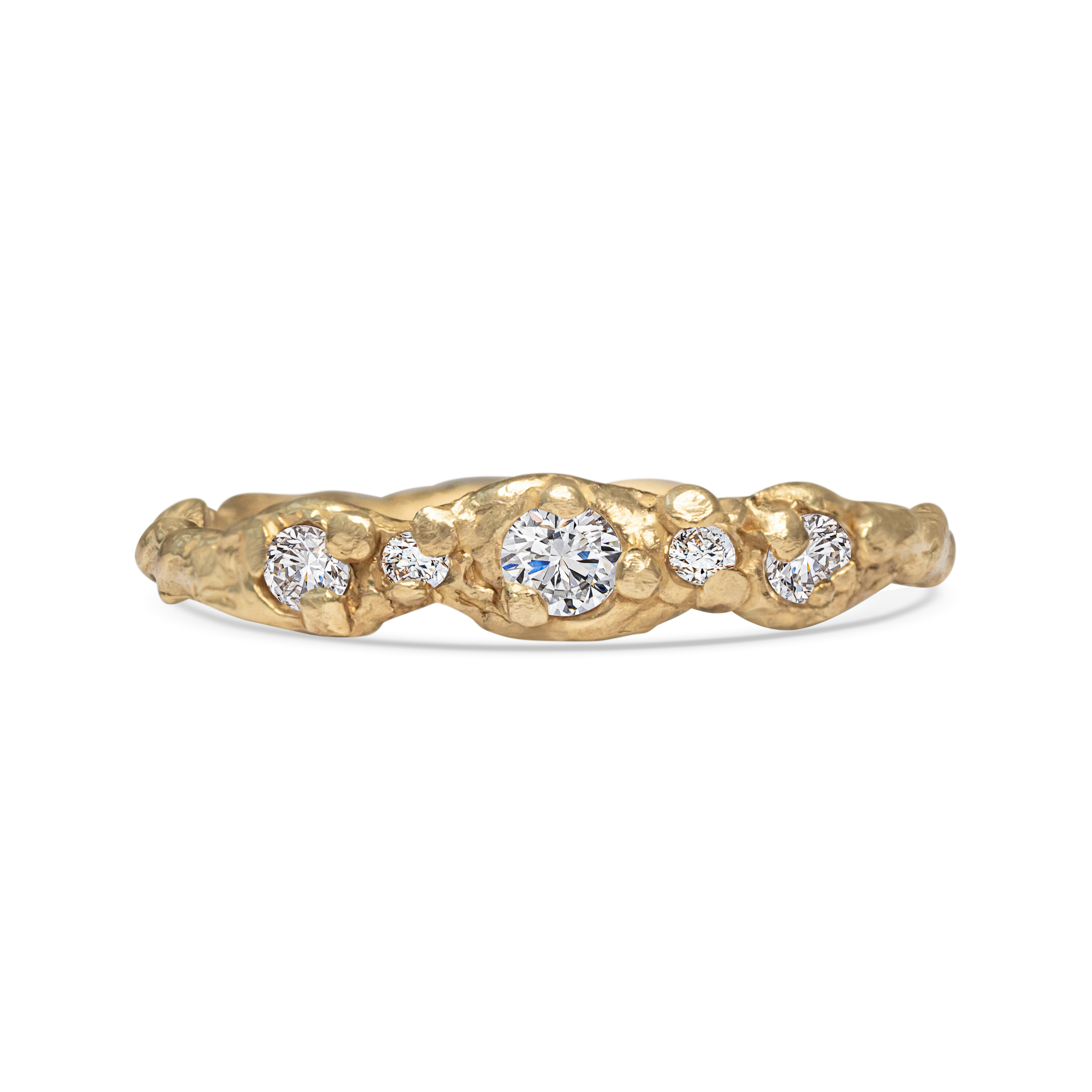 Gold ring with embedded diamonds on a white background