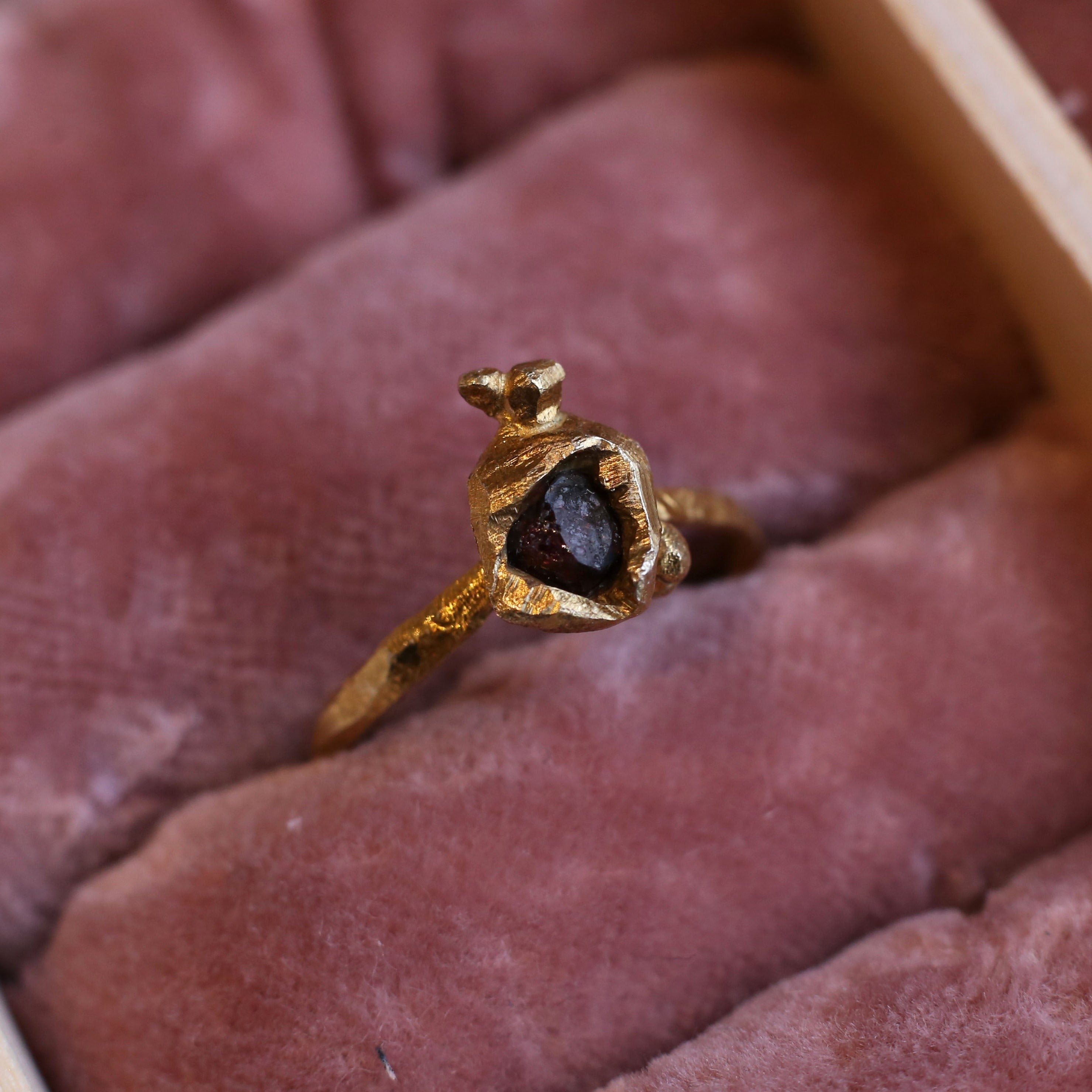 gold plated, sterling silver organic ring, set with a broken garnet