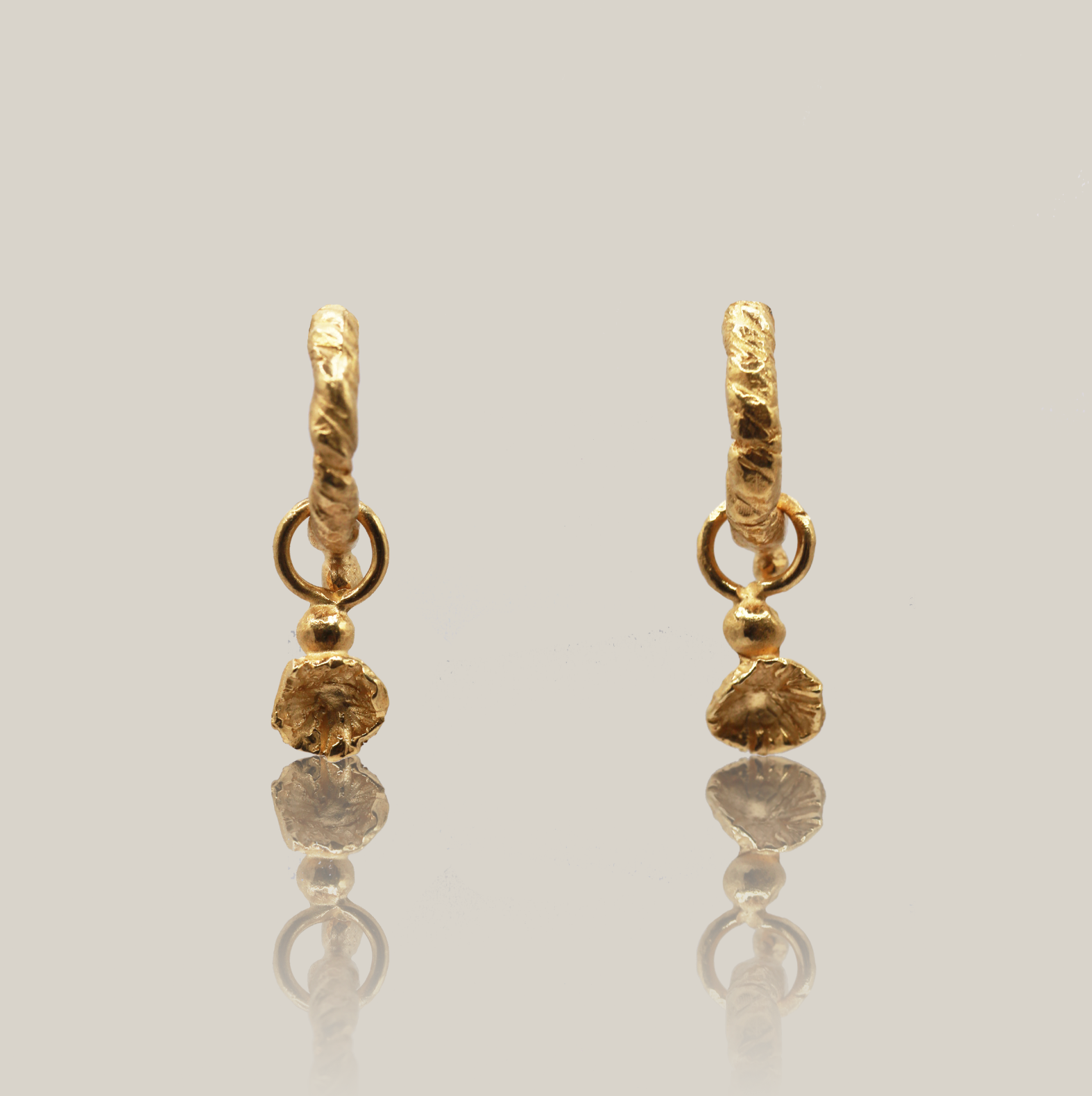 The flower drop earrings product shot gold vermeil
