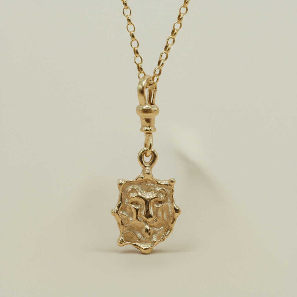 THE AURELION PENDANT — Lion Reversible Charm (9ct gold)