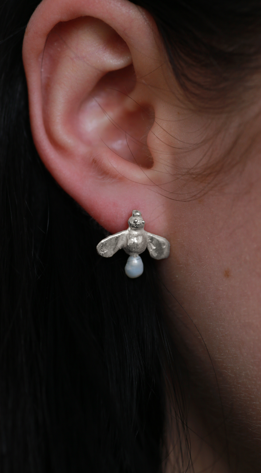 model wears the honey drop stud earrings in sterling silver