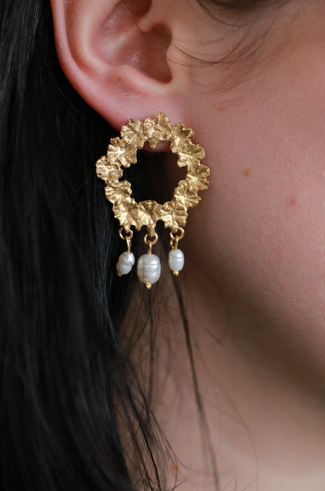 the bee wreath earrings gold vermeil on model