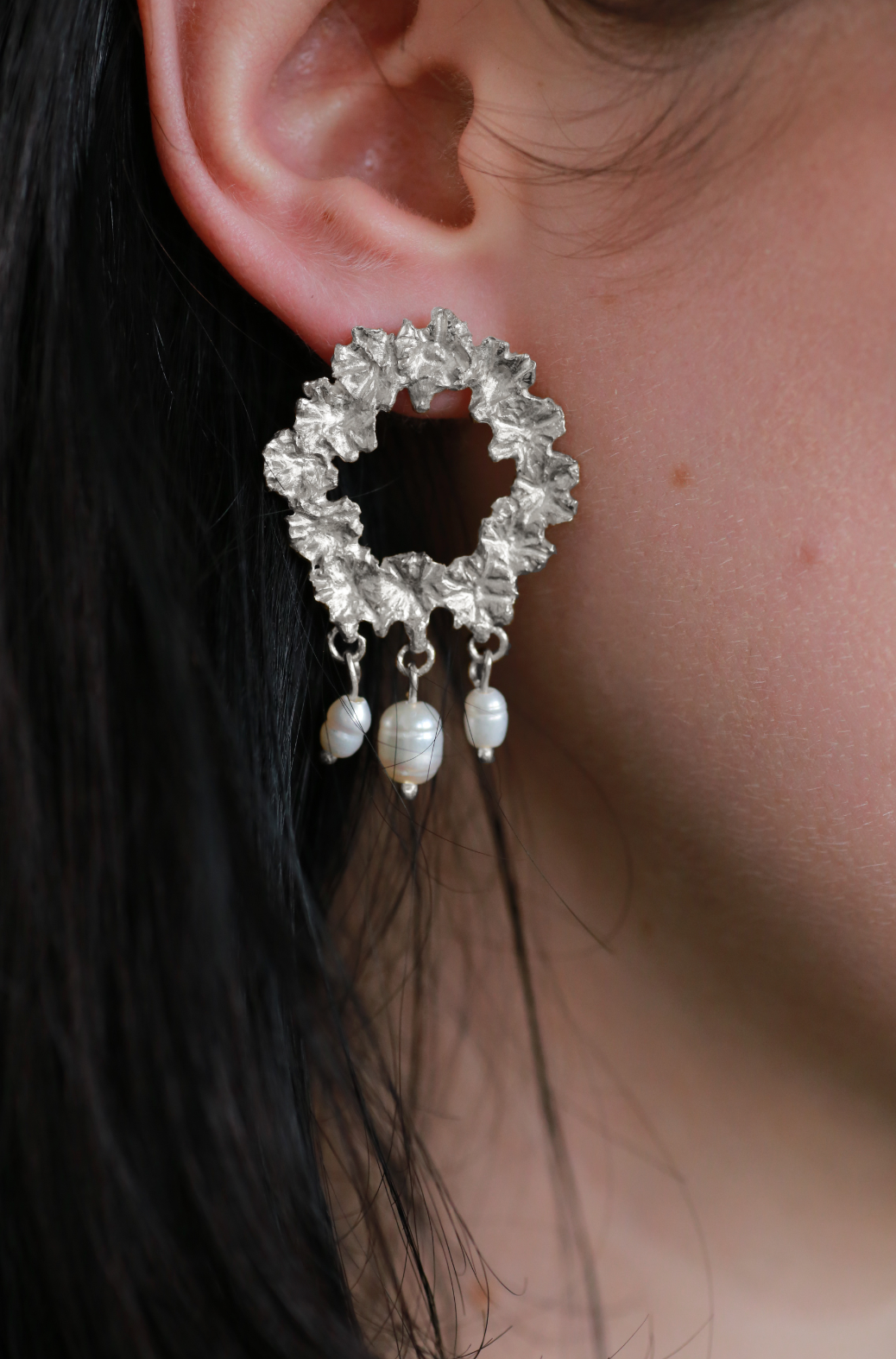 the bee wreath earrings sterling silver on model