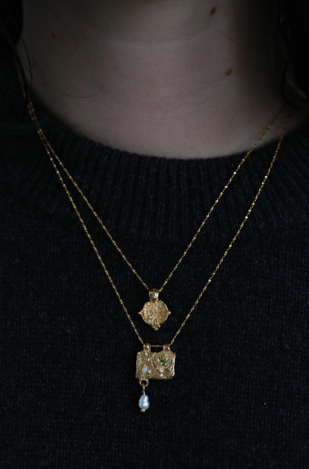 the flora tablet and the forget me not amulet gold vermeil model shot