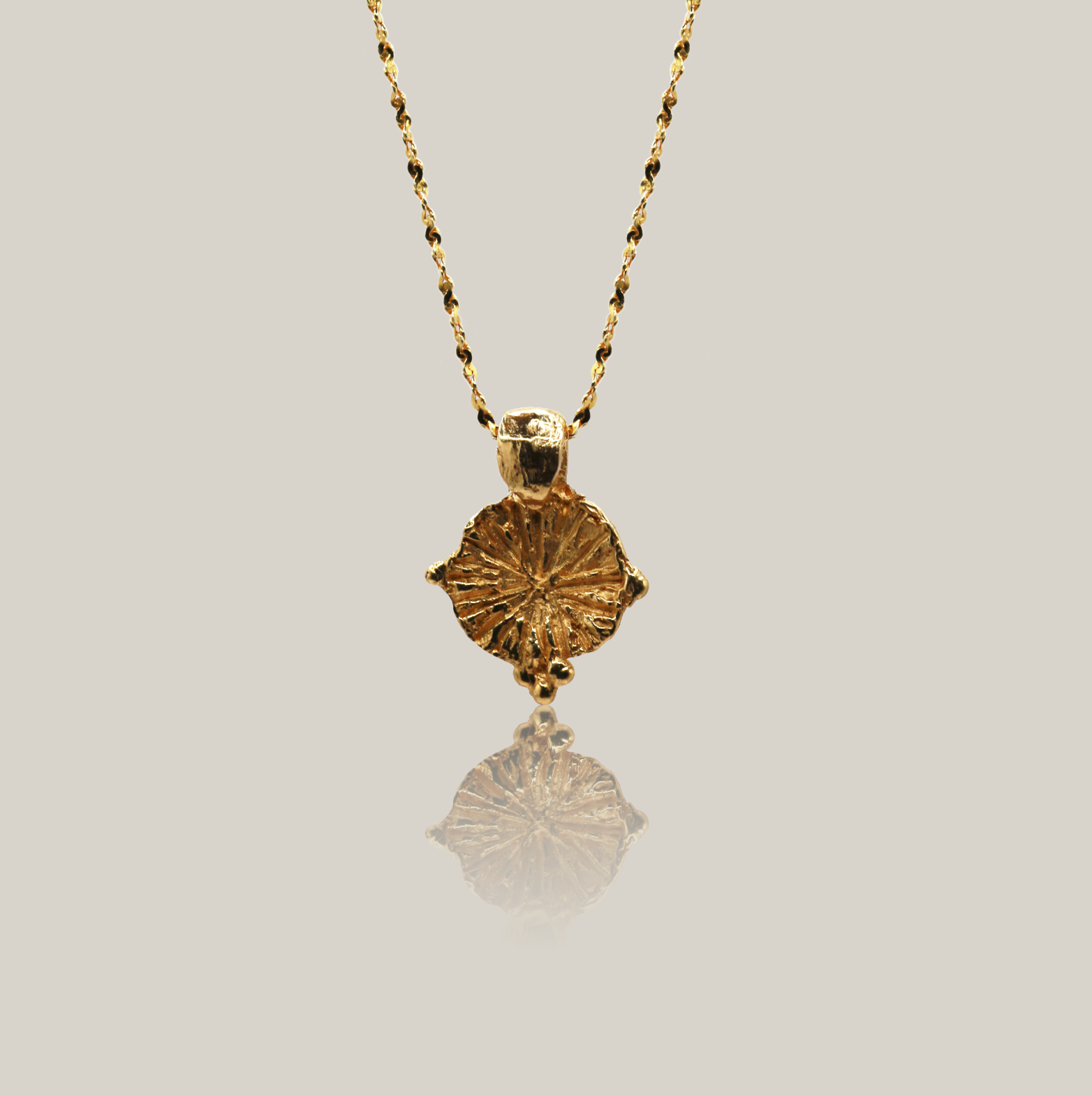 the forget me not amulet gold vermeil product shot