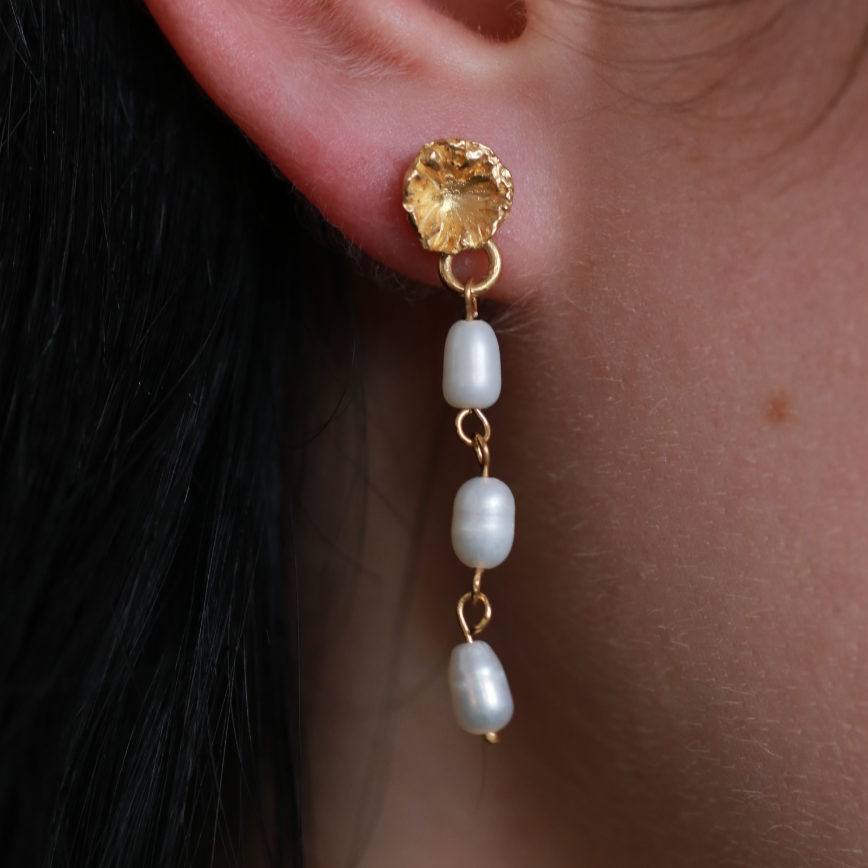 the forget me not dangly earrings gold vermeil model shot