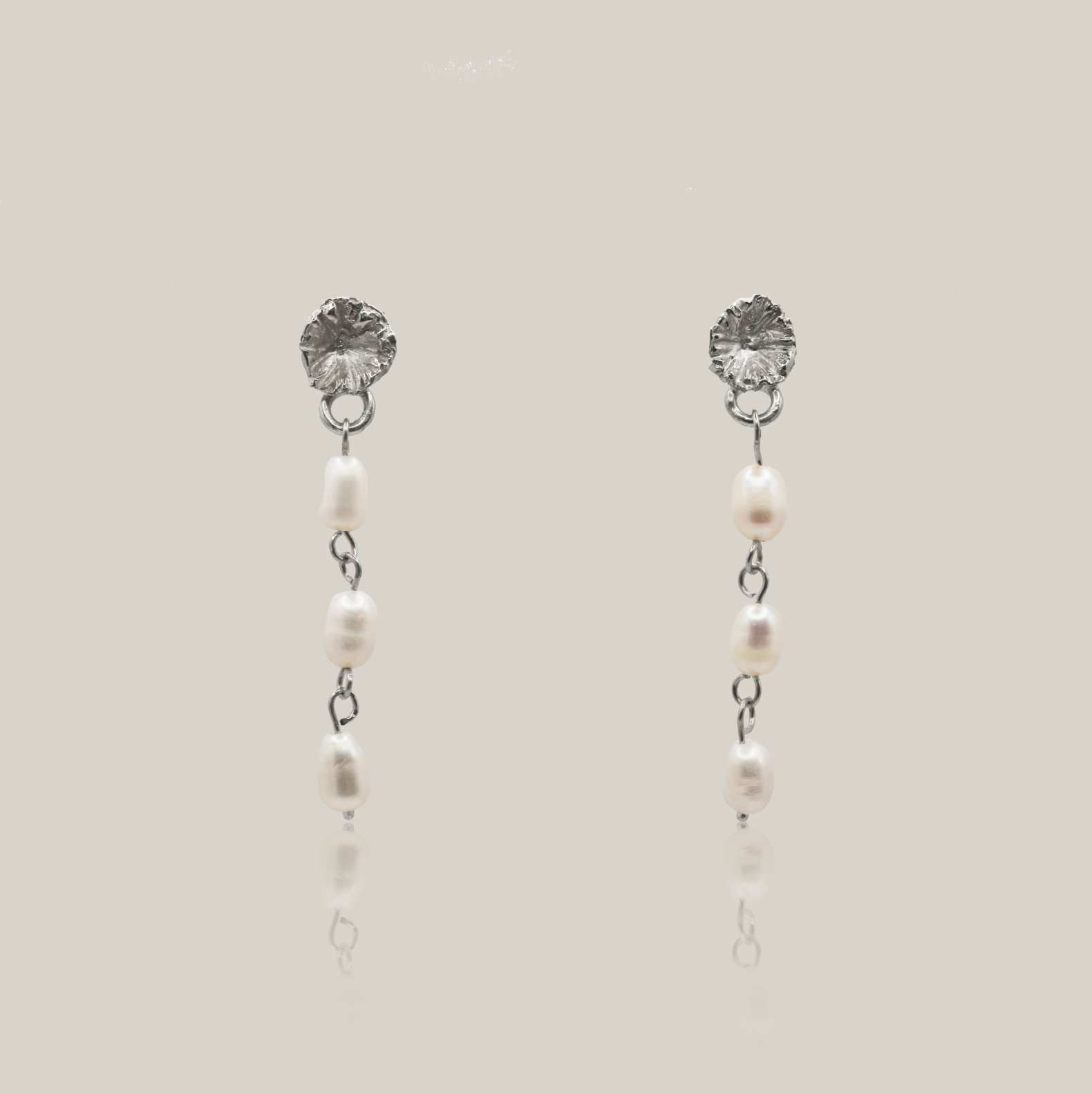 the forget me not dangly earrings sterling silver product shot