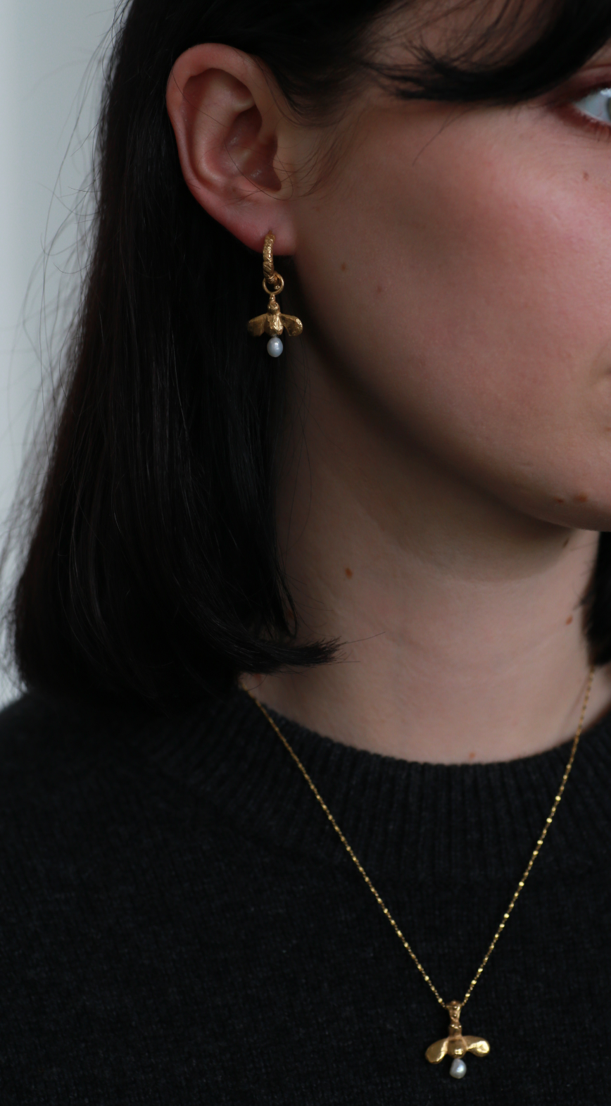 the honeybee drop earrings sterling silver worn on model gold vermeil