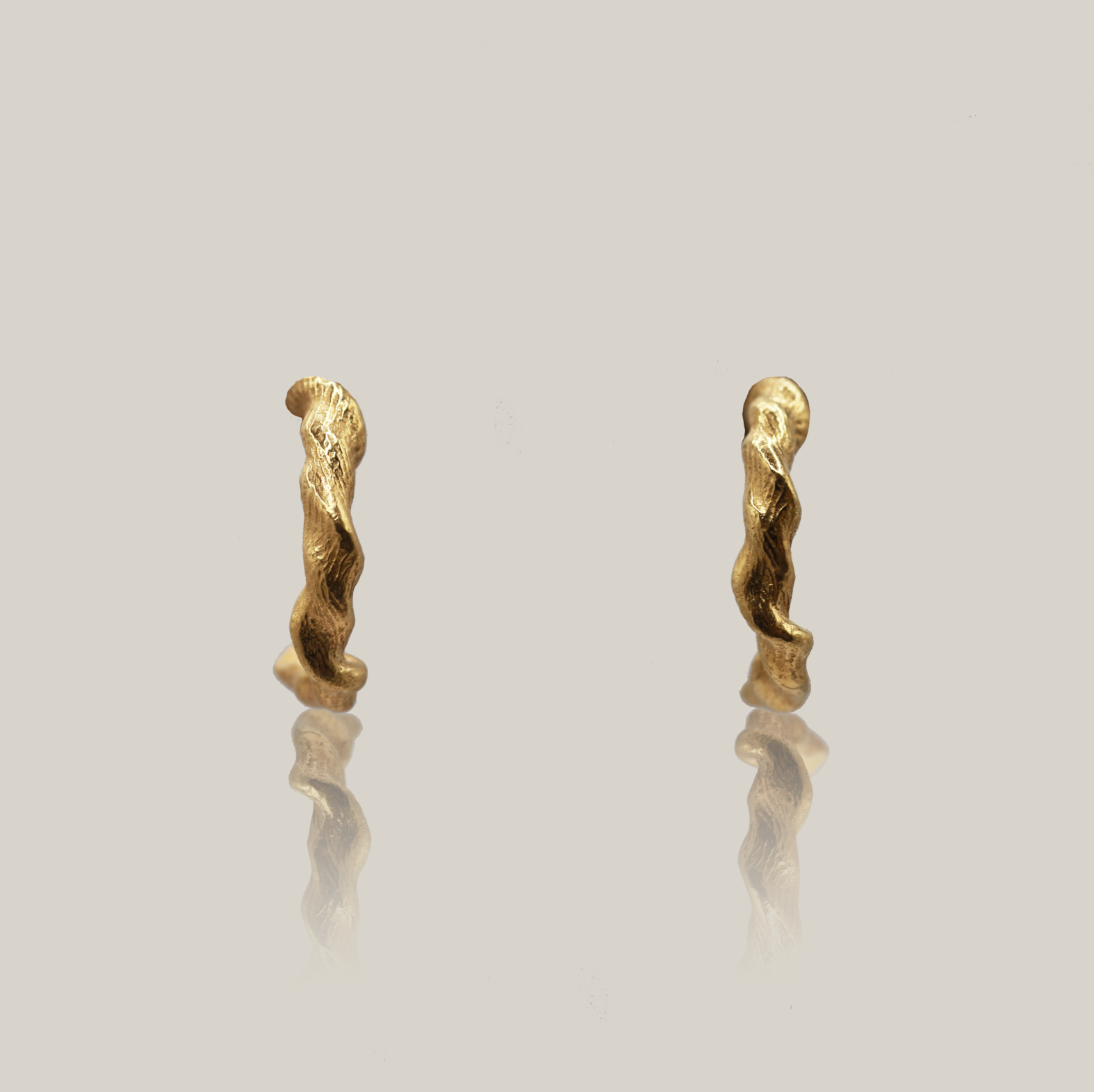 the twisted beeswax hoops gold vermeil product shot