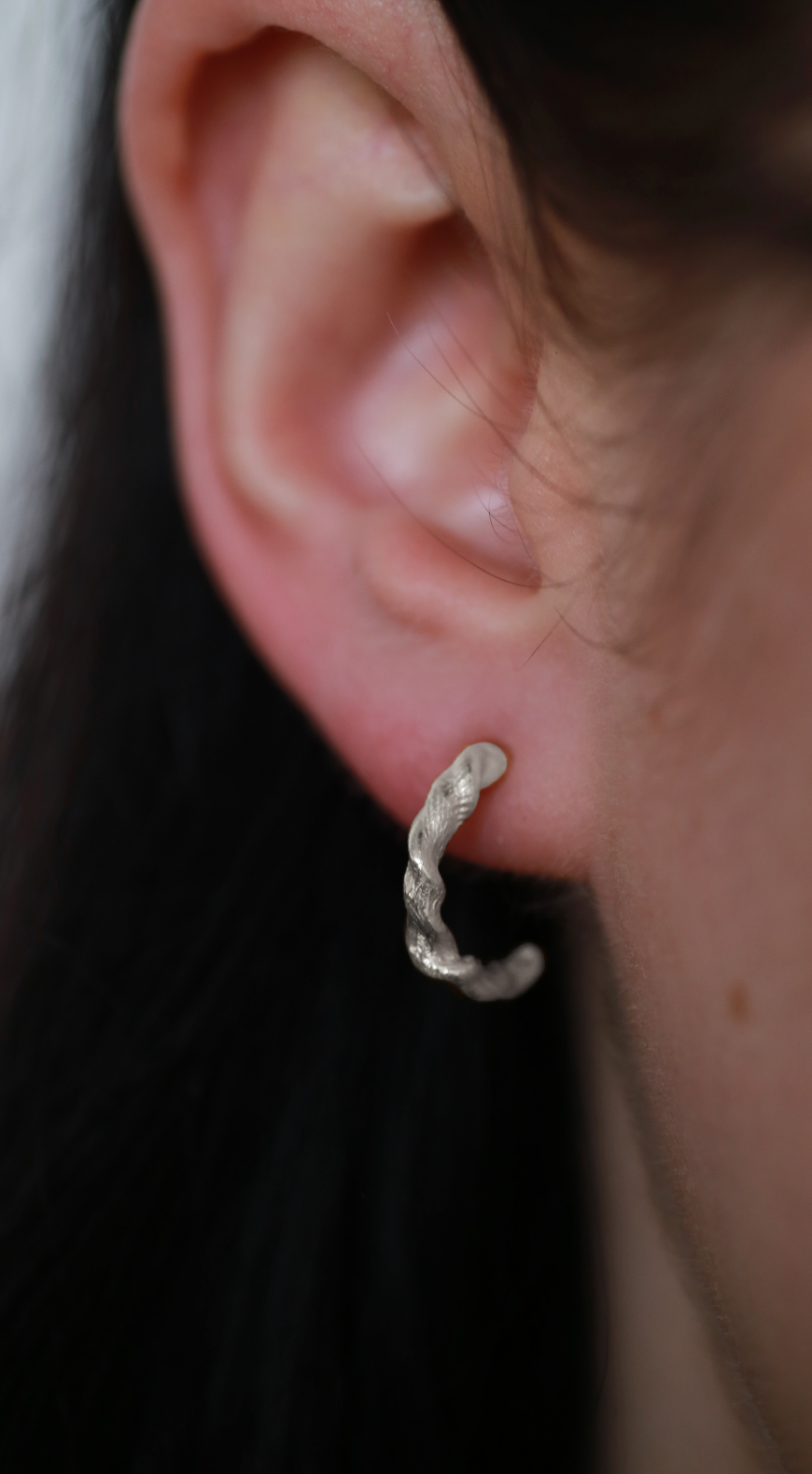 the twisted beeswax hoops sterling silver model shot front view
