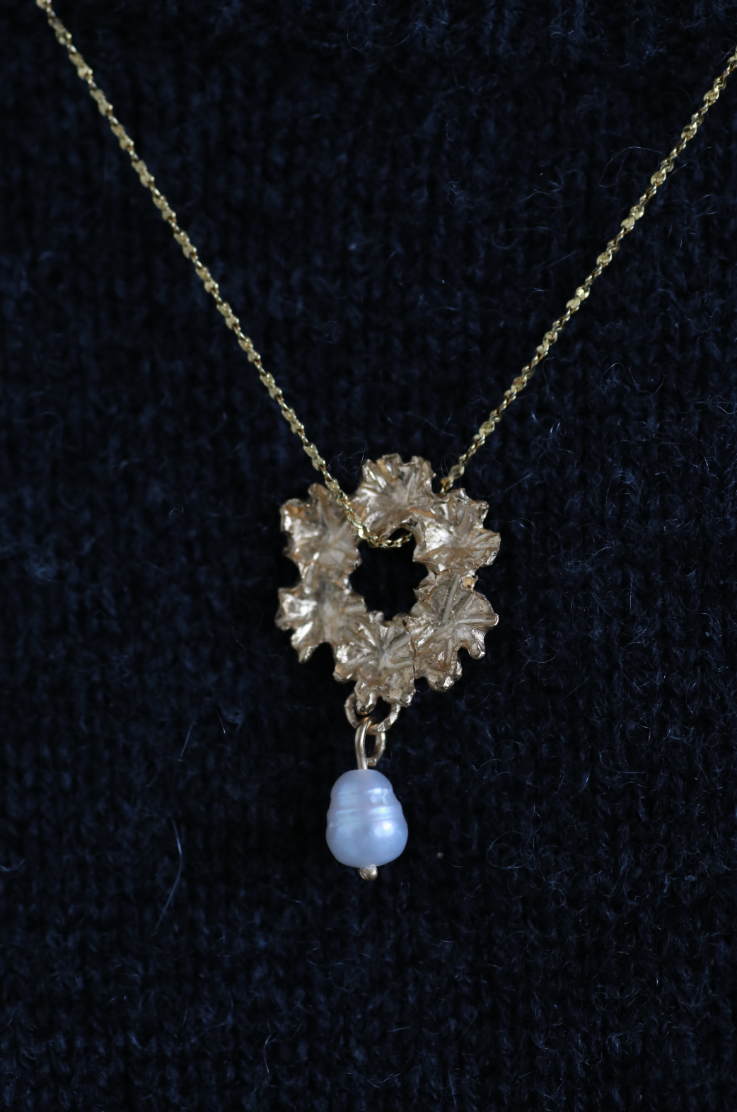 the wreath necklace gold vermeil model shot closeup